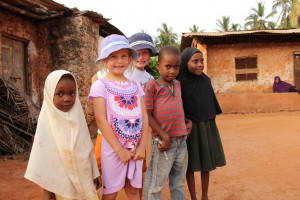 Audrey and Oliver with local kids in Ghana